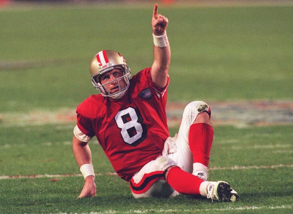 San Francisco 49ers wide receiver Jerry Rice takes off with a 51 yard Steve  Young touchdown pass during the second quarter of their game with the Tampa  Bay Buccaneers at Tampa Stadium